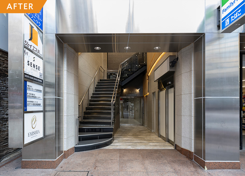 エントランス改修で印象一新、都会に映える建物へ